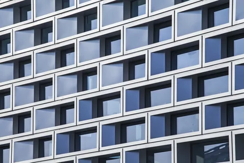 How Do Exterior Facade Tiles Impact the Overall Architecture of a Building?